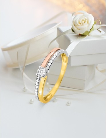 Bague solitaire accompagné...