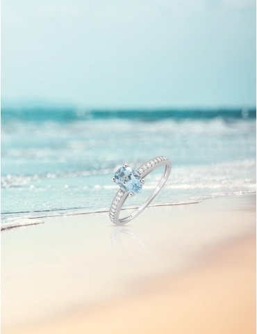 Bague or blanc 375‰, topaze...