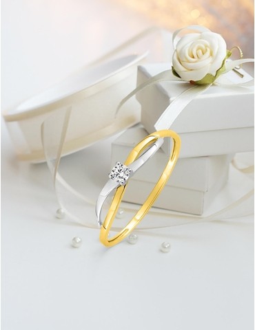 Bague solitaire bicolore...