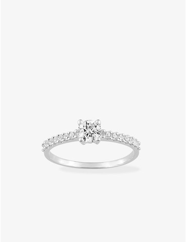 Bague solitaire accompagné...