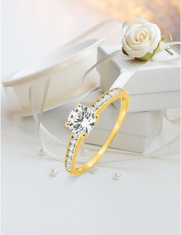 Bague solitaire accompagné...