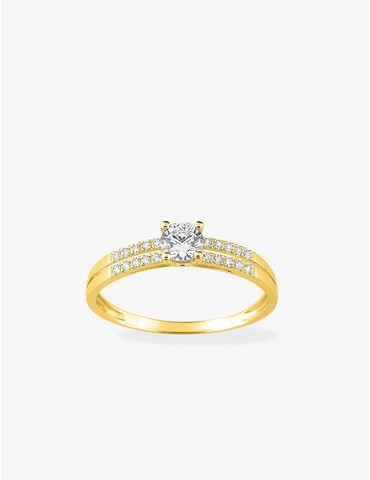 Bague solitaire accompagné...