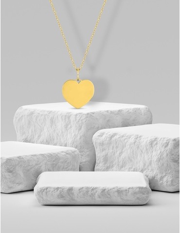 Pendentif cœur plein en or...
