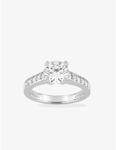 Bague solitaire accompagnée...