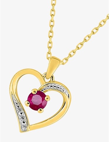 Collier or jaune 375‰ rubis...