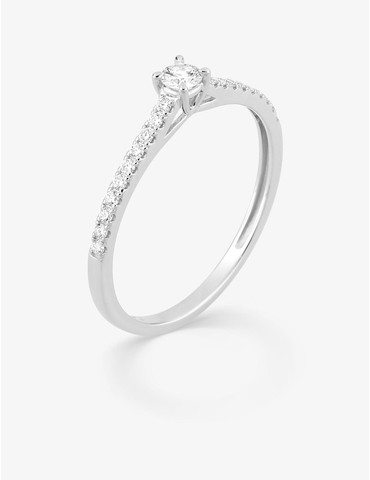 Bague solitaire accompagné...