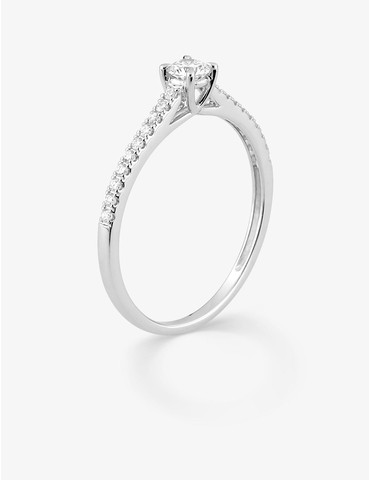 Bague solitaire accompagné...