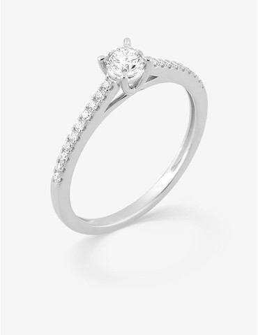 Bague solitaire accompagné...