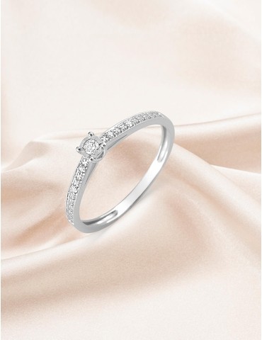 Bague solitaire accompagné...