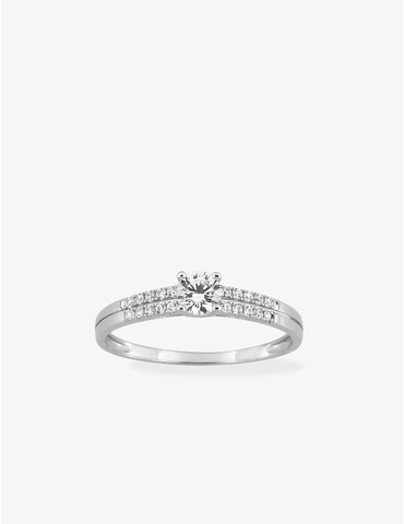 Bague solitaire accompagné...