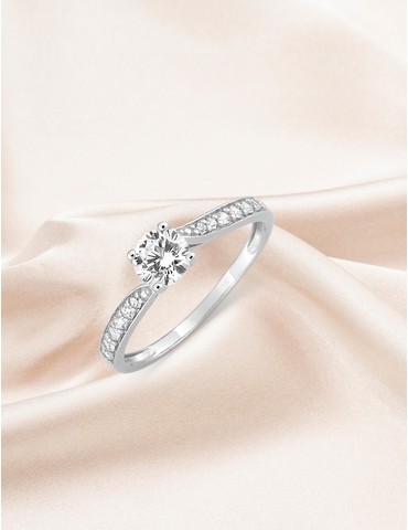 Bague solitaire accompagné...