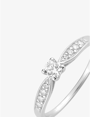 Bague solitaire accompagnée...