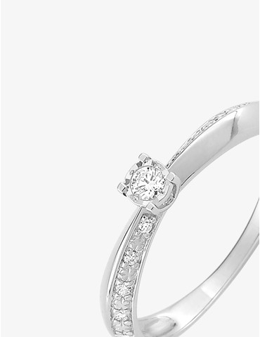 Bague solitaire accompagné...