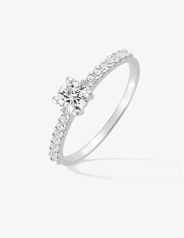 Bague solitaire accompagné...