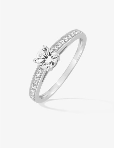 Bague solitaire accompagné...
