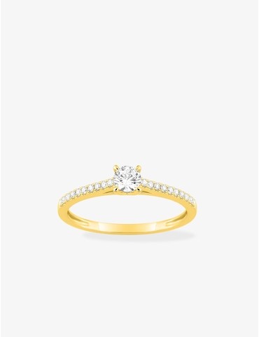 Bague solitaire accompagné...