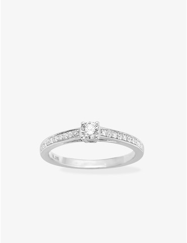 Bague solitaire accompagné...