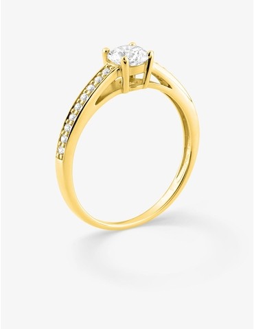 Bague solitaire accompagné...