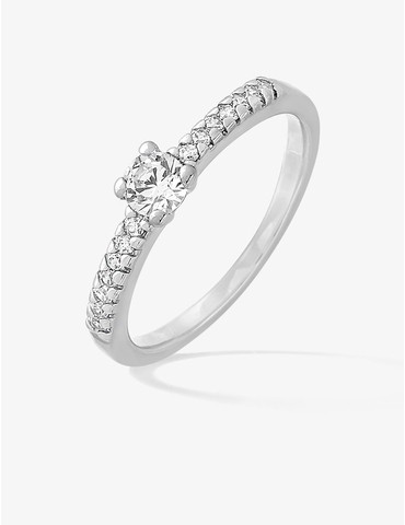 Bague solitaire accompagné...