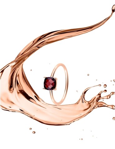 Bague or rose 750 ‰ et grenat