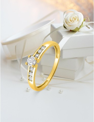 Bague solitaire accompagné...
