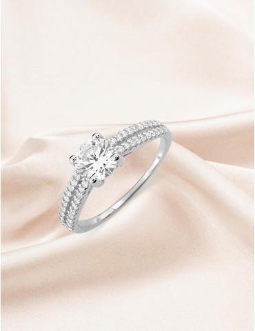 Bague solitaire accompagné...