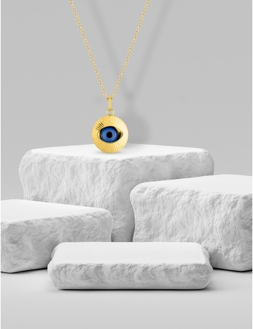 Pendentif œil en or jaune...
