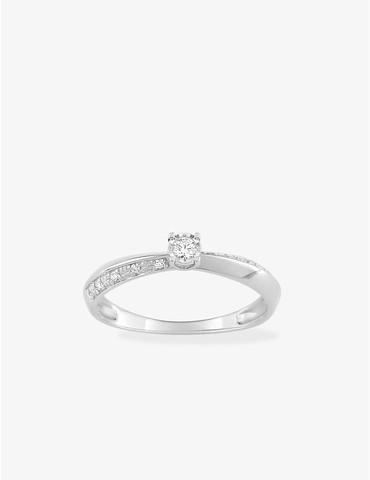 Bague solitaire accompagné...