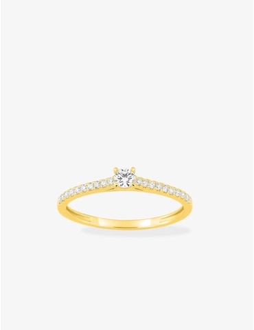 Bague solitaire accompagné...