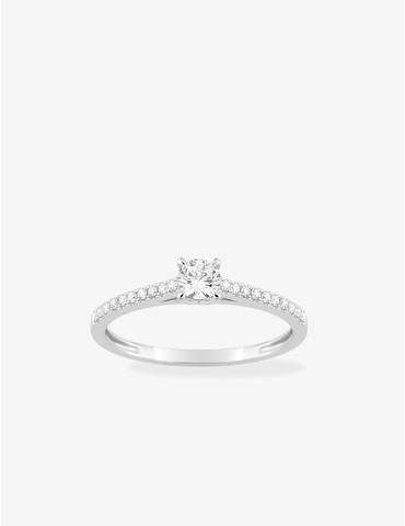 Bague solitaire accompagné...