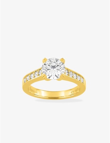 Bague solitaire accompagnée...