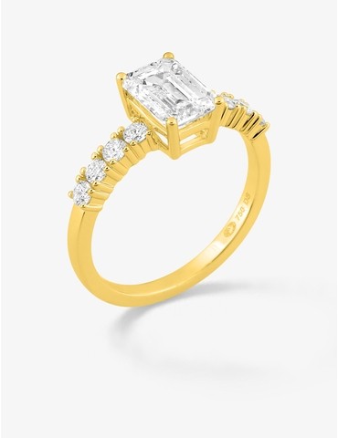 Bague solitaire accompagnée...